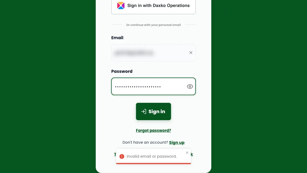 The sign-in form with the message Invalid email or password at the bottom of the screen